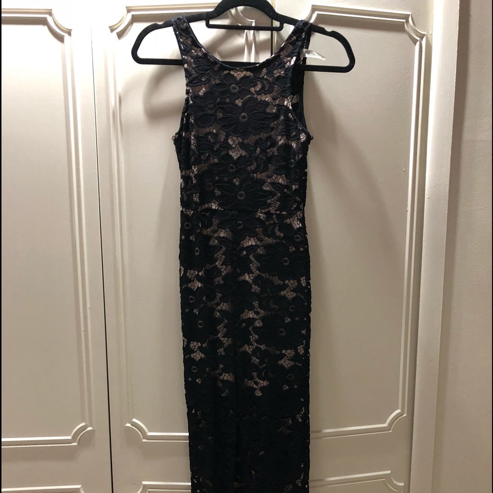 Black lace dress w/ nude underlining & front slit
